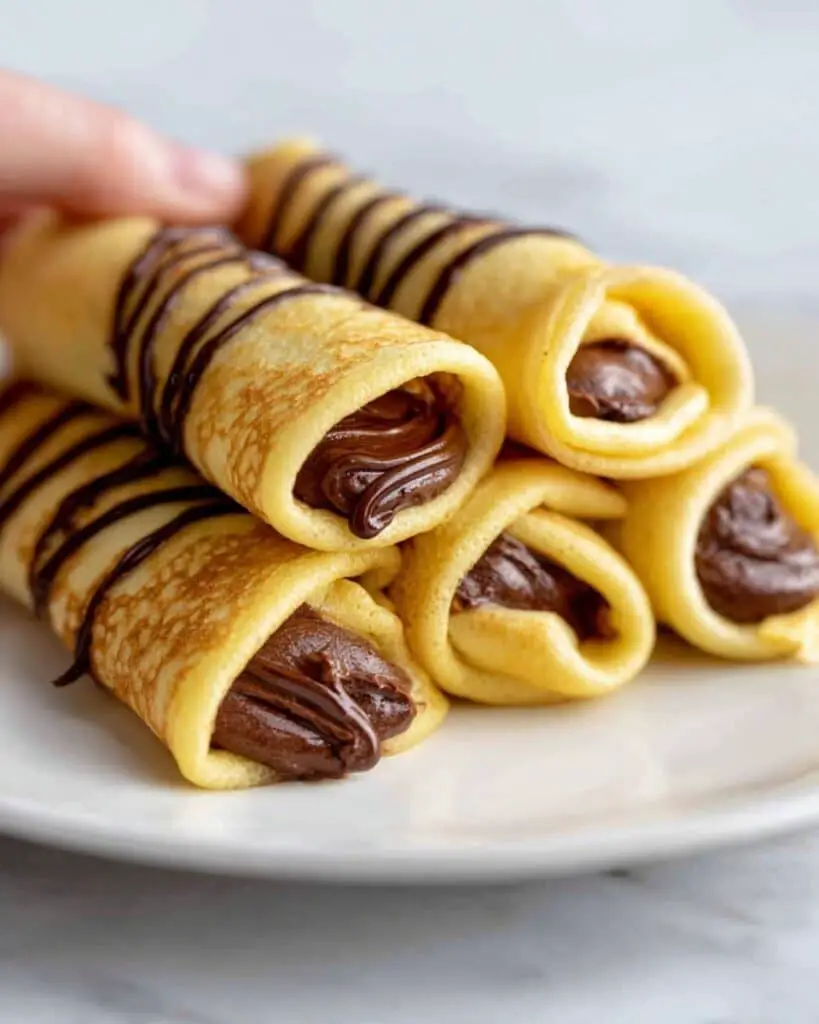 Easy Homemade Crepes with Fruit and Powdered Sugar Recipe