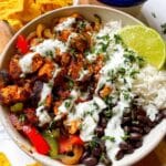 Chicken Fajita Bowl with Black Beans, Rice, and Lime Crema Recipe
