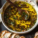 Irresistible Bread Dipping Oil with Herbs, Olives & Parmesan
