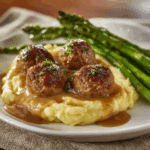 Juicy Salisbury Meatballs with Onion Gravy and Creamy Mashed Potatoes