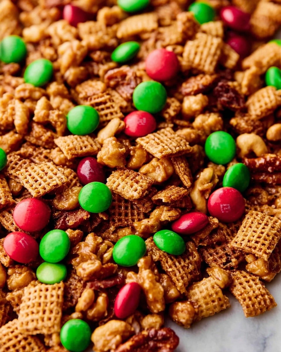 A close-up view of a crunchy snack mix piled together, featuring three main layers: the first layer is made of light brown, crispy waffle-shaped cereal pieces with a rough texture; the second layer includes small round candies scattered throughout, some bright green and others bright red, adding pops of color; the third layer is clusters of golden brown, chunky nuts and caramel-coated bits that give a sticky, shiny look. The whole mix sits on a white marbled surface. photo taken with an iphone --ar 4:5 --v 7