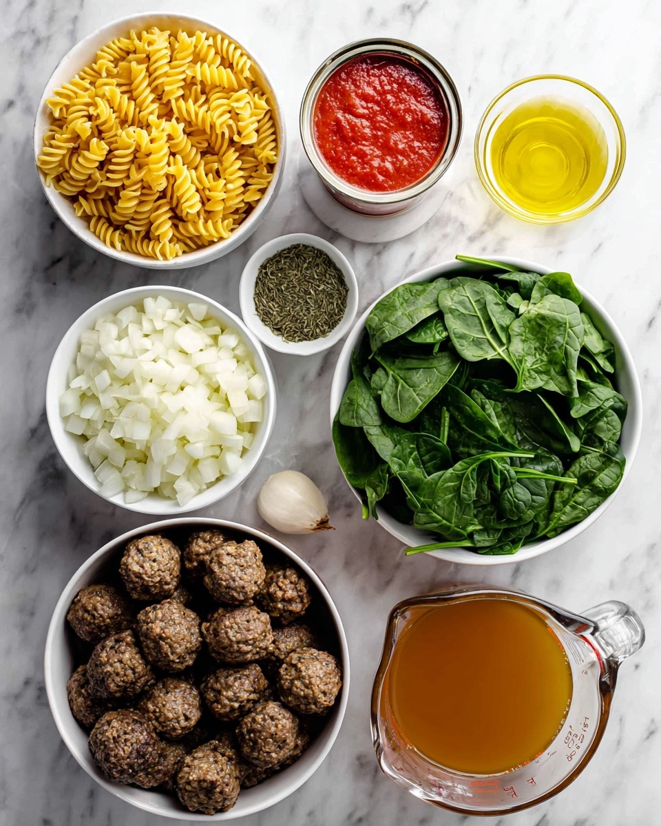 This image shows an overhead view of several white bowls and a glass measuring cup arranged neatly on a white marbled surface. There are cooked meatballs in a white bowl at the bottom left, next to a bowl filled with bright green spinach leaves on the right. Above the spinach, a small white bowl holds dried green herbs, with a small bowl of minced garlic close by. A larger bowl contains diced white onions, placed near a bowl of uncooked yellow spiral pasta. A small bowl of light yellow olive oil sits near a can of red tomato sauce, and the glass measuring cup at the bottom right holds a golden brown broth. The colors are vibrant and fresh, all set on a clean, bright background. photo taken with an iphone --ar 4:5 --v 7