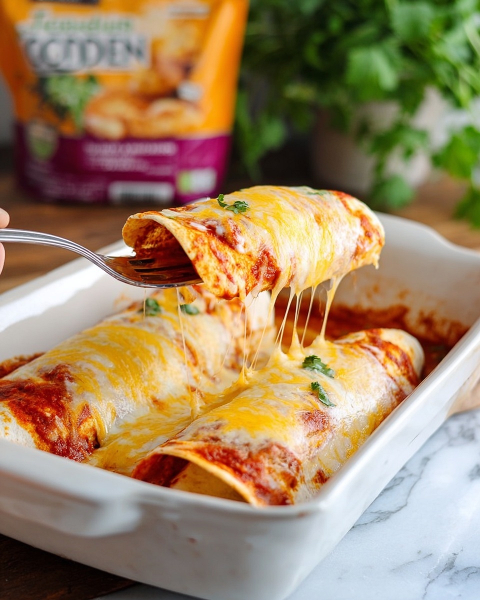 The image shows two rolled tortillas covered with melted yellow and white cheese, placed side by side in a white rectangular baking dish. The tortillas have red sauce smudges visible underneath the cheese, especially near their ends. Cheese stretches from the lifted tortilla to the one still in the dish, showing its gooey texture. A woman's hand is holding a silver fork that lifts the tortillas slightly above the dish. In the background, there is a blurred view of a green leafy plant and an orange and purple food package on a white marbled surface. photo taken with an iphone --ar 4:5 --v 7