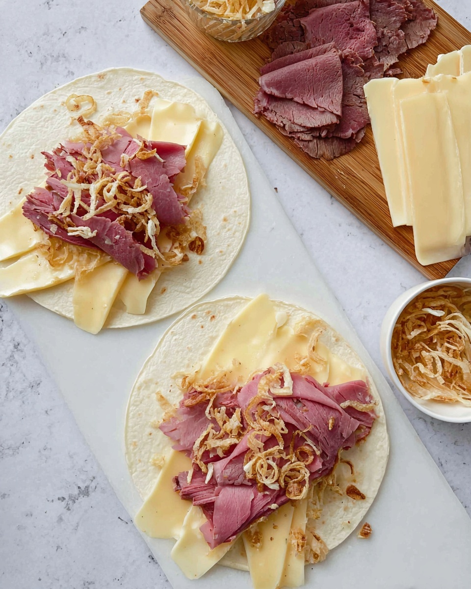 Two tortillas lie flat on a white marbled surface, each layered with uneven slices of pale yellow cheese arranged near the edges. On top of the cheese, there are thin folded slices of pink roast beef, spreading towards the tortilla centers. Scattered over the roast beef are light brown crispy fried onion pieces. To the right, a wooden cutting board holds a small pile of folded roast beef slices and three pale yellow cheese slices in a neat stack. A white bowl next to the board contains more crispy fried onions. Photo taken with an iphone --ar 4:5 --v 7