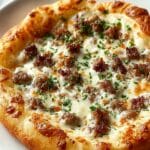 Biscuits and Sausage Gravy Breakfast Pizza Recipe