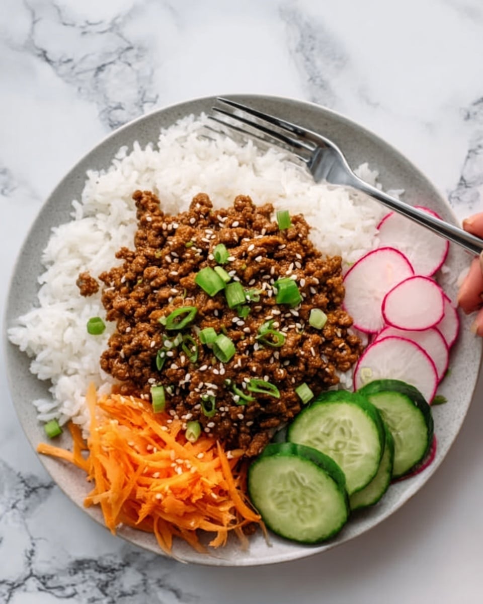 The dish shows a white round plate on a white marbled surface, filled with a base layer of fluffy white rice. On top of the rice, slightly off-center, there is a thick layer of brown cooked ground meat mixed with some sauce, sprinkled with white sesame seeds and small green onion pieces. Next to the meat, there is a bright orange shredded carrot pile, thinly sliced round pink radish pieces overlapping each other, and fresh green cucumber slices arranged in a neat row on the side. A woman's hand is holding a fork above the plate. Photo taken with an iphone --ar 4:5 --v 7