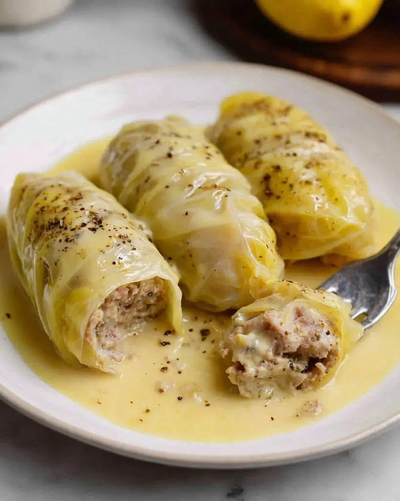 Greek Stuffed Cabbage Rolls with Lemon Avgolemono Sauce Recipe