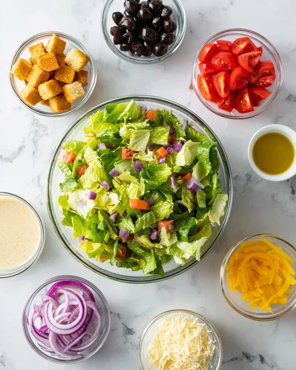 A clear glass bowl filled with chopped green lettuce, mixed with small bits of orange carrot and purple cabbage, sitting in the center on a white marbled surface. Surrounding it are seven small clear bowls arranged in a circle: golden-brown croutons at top left, dark black olives at top center, bright red sliced tomatoes at top right, light yellow dressing at middle left, white shredded cheese at middle right, sliced yellow pepper rings at bottom left, and purple sliced red onions at bottom center. The image shows a clean and fresh salad setup, photo taken with an iphone --ar 4:5 --v 7