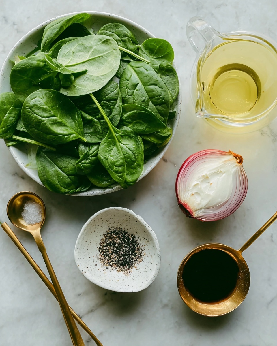 A white marbled surface holds fresh green spinach leaves spread around, a small white bowl with black and white pepper and salt with half a red onion placed inside it, a round glass jug filled with light yellow oil, a gold measuring spoon holding a white creamy ingredient, and a gold measuring spoon filled with dark brown liquid nearby, all arranged in a neat flat lay style photo taken with an iphone --ar 4:5 --v 7