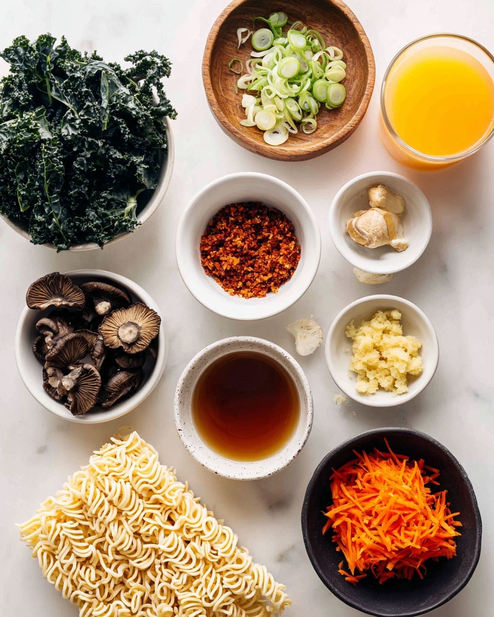 The image shows various ingredients placed on a white marbled surface, arranged in small white and dark bowls and loose on the surface. On the left bottom, there is a block of uncooked curly noodles in pale yellow. Above it, several dark brown dried mushrooms are scattered around a small bowl filled with a medium brown liquid. To the top left, a white bowl holds dark green leafy kale. A small white bowl at the top center contains red-brown crispy crumbs, next to a wooden bowl with sliced green onions. To the right, a white bowl holds pale yellow minced garlic, and below it a black bowl has light yellow mashed ginger. A white bowl at the bottom right contains bright orange shredded carrots. On the far right, a glass filled with orange juice is visible. photo taken with an iphone --ar 4:5 --v 7