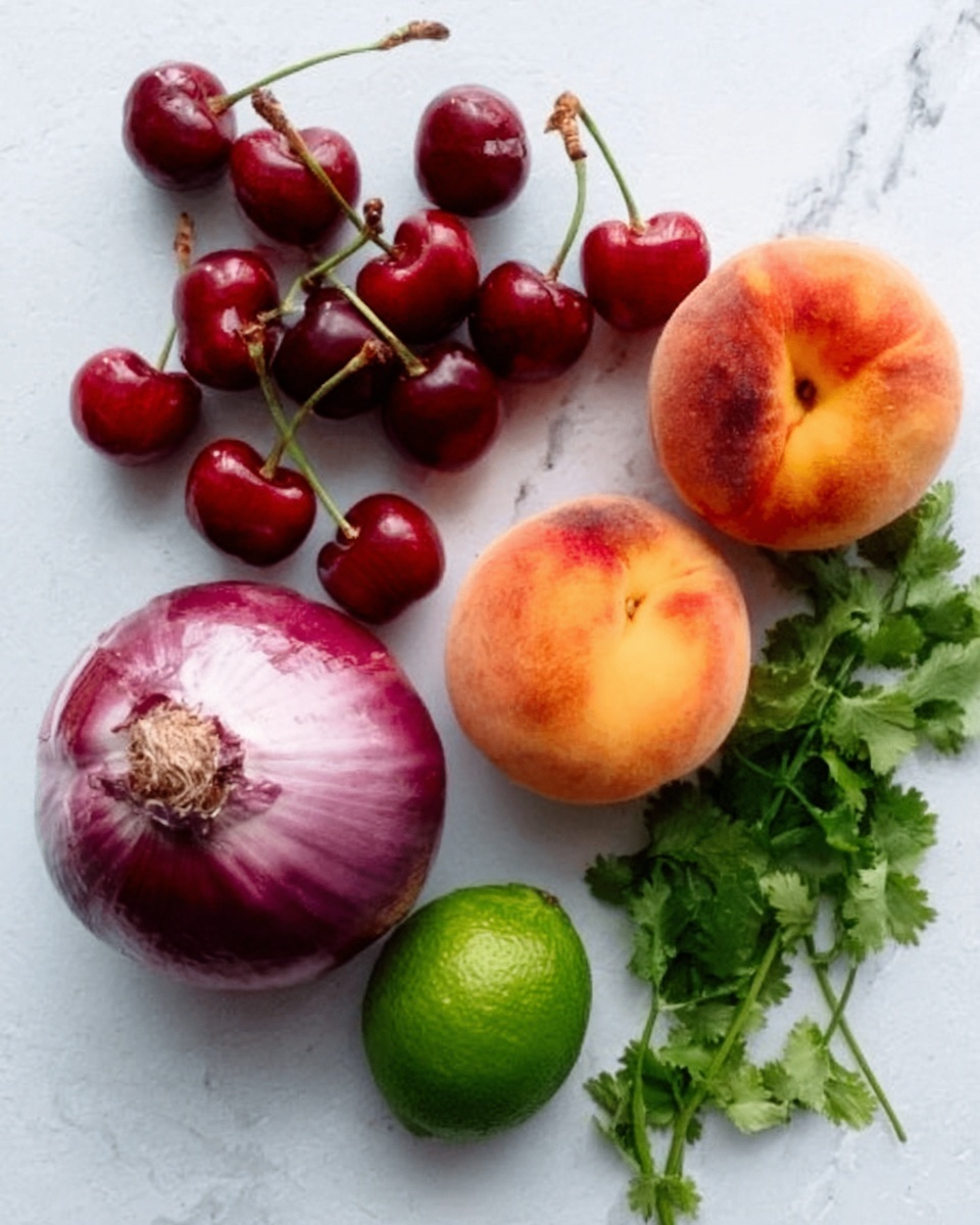 The image shows a white marbled surface with a small bunch of red cherries with green stems near the top left. Below the cherries, there is a whole purple onion cut in half with visible rings. To the bottom center, there are three ripe peaches with soft, fuzzy orange skin and slight red blushes. Near the right side, there is a small green lime and a small bunch of fresh green cilantro with leafy stems. The colors are bright and fresh, with the red cherries and peaches standing out against the white marble background, and the green lime and cilantro adding a fresh touch. Photo taken with an iphone --ar 4:5 --v 7