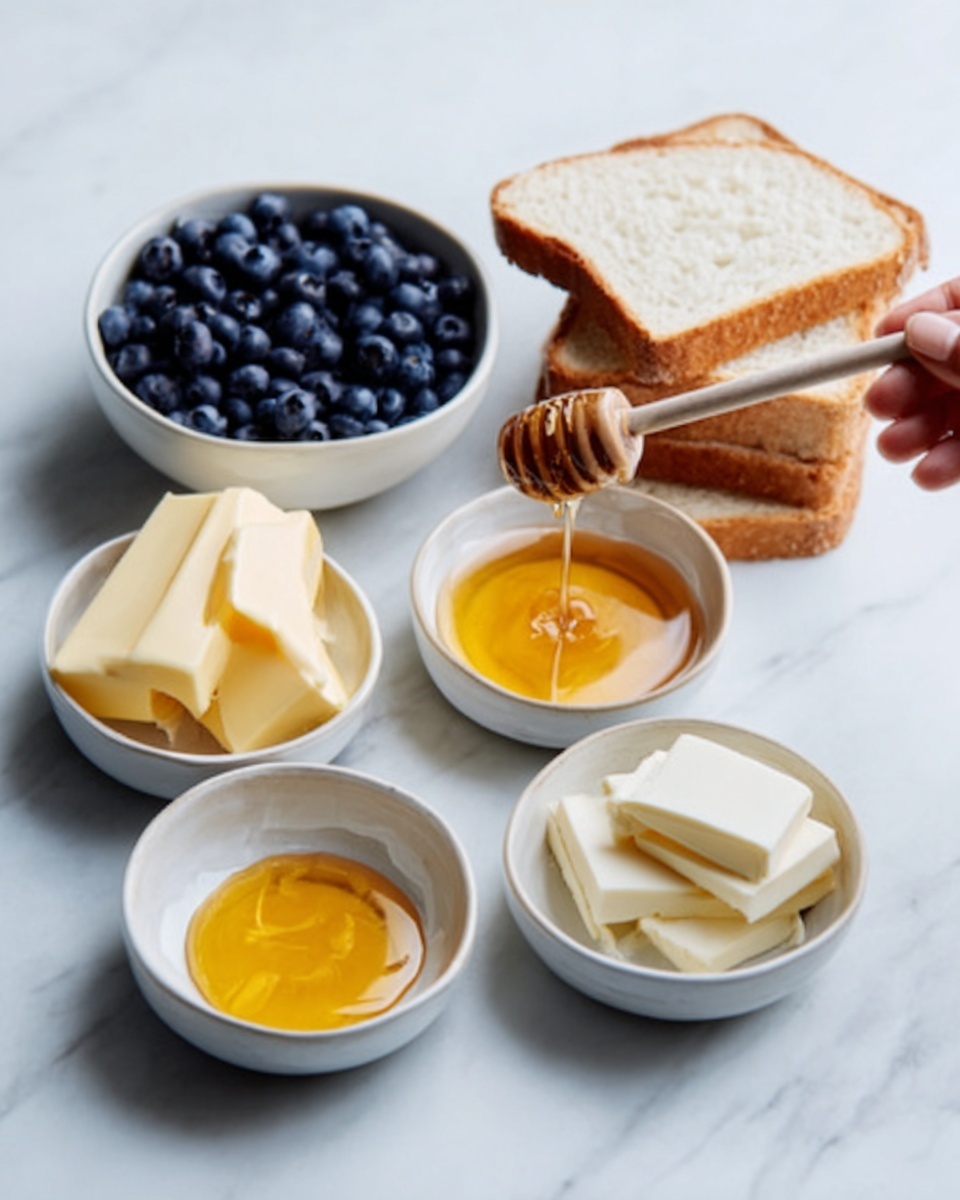 The image shows six small white bowls and a stack of sliced white bread arranged on a white marbled surface. One bowl is filled with dark blue blueberries, with a woman's hand holding a wooden honey dipper over a bowl of honey that is golden brown and glossy. Another bowl contains a bright amber liquid, likely syrup, with a smooth surface. Two bowls show slices of pale yellow butter and white cheese, each neatly stacked and slightly overlapping. The sliced white bread is stacked in a small pile, showing its soft, light texture. Photo taken with an iphone --ar 4:5 --v 7