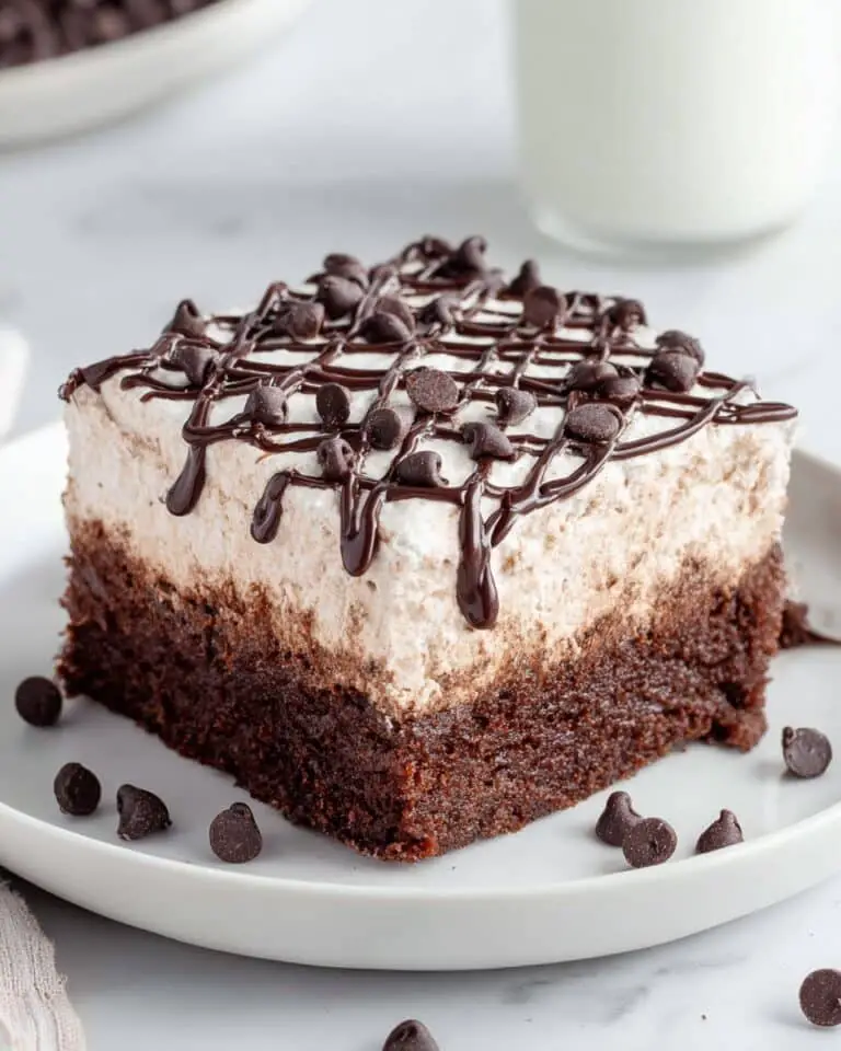 Chocolate Poke Cake with Chocolate Whipped Topping and Mini Chips Recipe