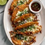 Authentic Birria Tacos with Rich Red Sauce and Melted Oaxacan Cheese Recipe
