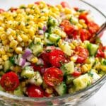 Fresh Corn Salad with Cherry Tomatoes, Bell Peppers, and Cotija Recipe