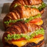 Croissant Smash Burgers with Caramelized Onions and Garlic Butter Recipe