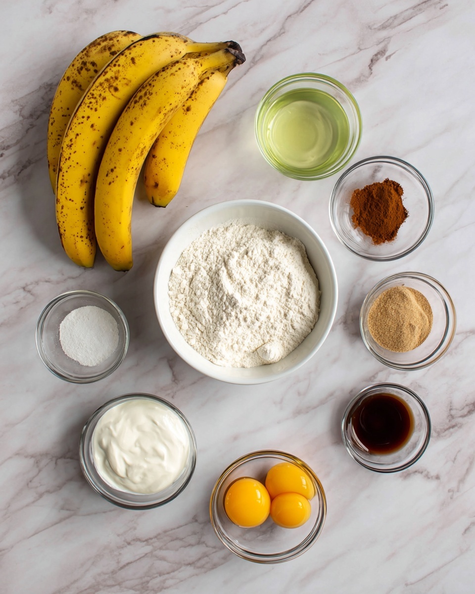 The image shows a white marbled surface with ingredients arranged neatly for baking or cooking. At the top left, there is a bunch of four ripe yellow bananas with brown spots. Below the bananas, a small clear glass bowl holds a light green liquid, likely oil. At the center, a white bowl is filled with white flour. To the top right of the flour, a small clear glass bowl contains three powders: white, brown, and beige, likely baking powder, cinnamon, and salt. Next to it, another small clear glass bowl has brown sugar or a similar granular ingredient. Below these, a small clear glass bowl contains white yogurt or cream with a smooth texture. At the bottom center, a small clear glass bowl holds two raw eggs with bright yellow yolks and clear whites. Lastly, to the bottom right, another small clear glass bowl contains a dark brown liquid, possibly vanilla extract. All ingredients are spaced evenly on the white marbled surface. photo taken with an iphone --ar 4:5 --v 7