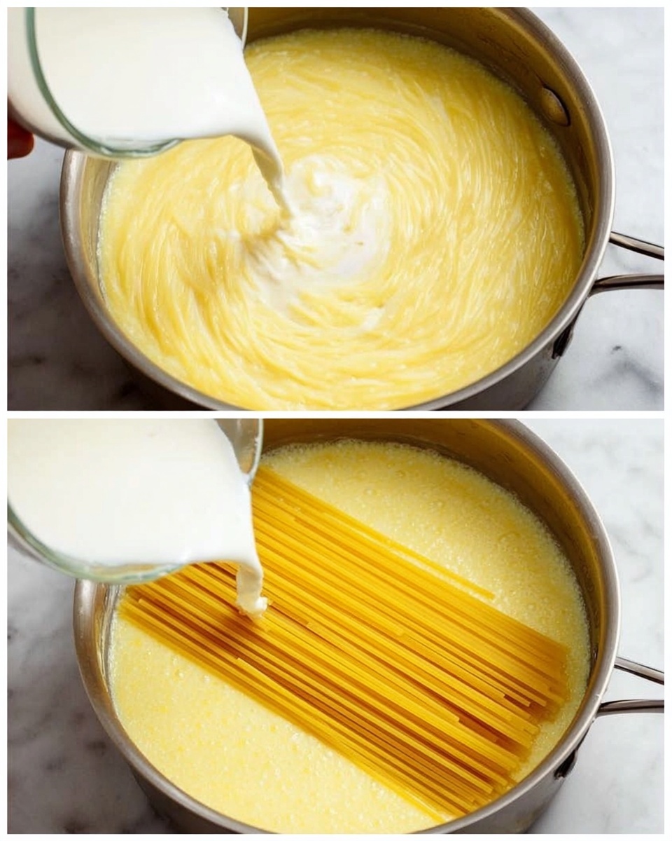 Two images show the process of making pasta in a round metal pan. In the first image, a creamy yellow sauce with soft texture fills the pan, while a woman’s hand pours white milk into it, adding a swirling effect on the sauce surface. In the second image, uncooked yellow spaghetti lays straight and long, placed diagonally across the same pan, resting on top of the creamy sauce, bright and smooth. The scene is set on a white marbled surface. photo taken with an iphone --ar 4:5 --v 7
