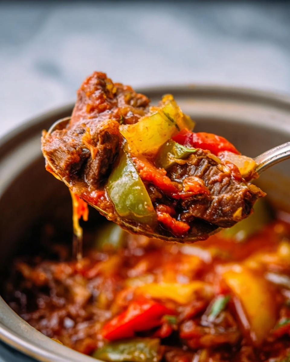 The image shows a close-up of a spoonful of stew lifted above a pot with a white marbled surface background. The stew has several layers of colorful ingredients: chunks of brown meat with a rich sauce, pieces of green and yellow bell peppers, and slices of white onion mixed with small bits of red pepper. The sauce looks thick and glossy, with a deep reddish-brown color that drips slightly from the spoon. The spoon is held by a woman's hand, showing the texture and juiciness of the cooked ingredients in a warm, home-cooked style. Photo taken with an iphone --ar 4:5 --v 7