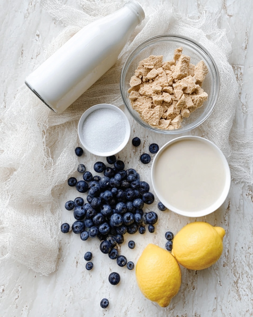 The image shows an overhead view of ingredients arranged neatly on a white marbled surface. In the middle, there is a small pile of fresh blueberries with deep blue color and smooth texture. Above the blueberries, there is a clear glass bowl filled with light brown, bite-sized pieces of crumbly food. To the right of the bowl, there is a small white round bowl containing a creamy white liquid, and below it, another white bowl filled with granulated white sugar. On the left side, there is a white bottle, likely containing milk or cream, lying on its side. To the bottom right, there is a whole yellow lemon next to a half lemon with a bright yellow skin and fresh juicy inside. A white cloth with a soft texture is draped loosely around the ingredients, adding a cozy feel. photo taken with an iphone --ar 4:5 --v 7