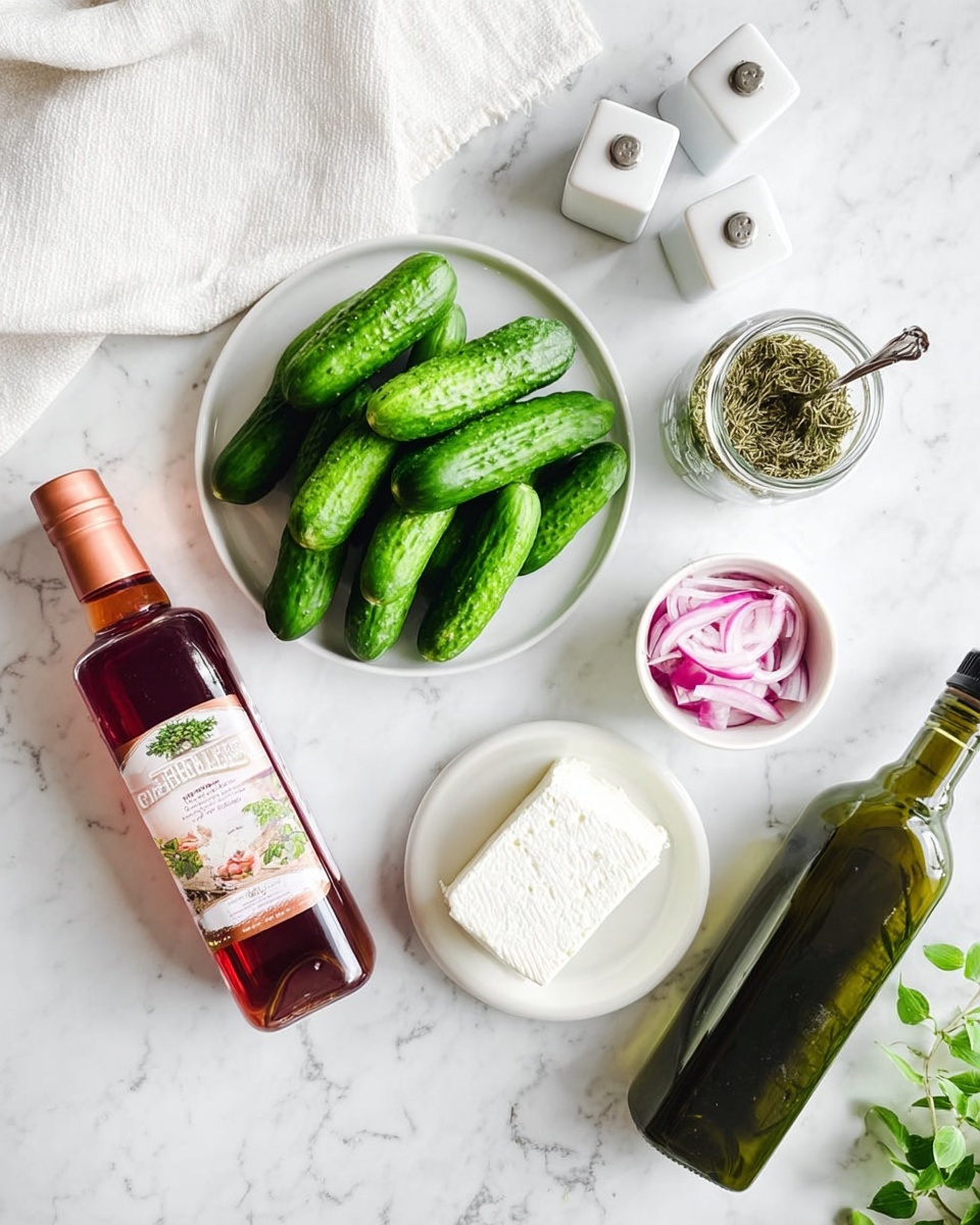 On a white marbled surface, there is a cluster of fresh small green cucumbers in the center. Below, a white plate holds a single rectangular block of white cheese with a slightly crumbly texture. To the right of the cucumbers, a small white bowl contains sliced red onions. Above the cucumbers, a clear jar filled with green dried herbs is placed. To the right of the jar is a dark green bottle with a metal spout. To the left of the cucumbers lies a tall bottle of red wine vinegar with a copper-colored label. Above on the left, there are two white square salt and pepper shakers, and a white cloth is partially spread across the top. In the top right corner, a small green leafy plant is visible. The overall look is clean and fresh with bright, natural colors. Photo taken with an iphone --ar 4:5 --v 7