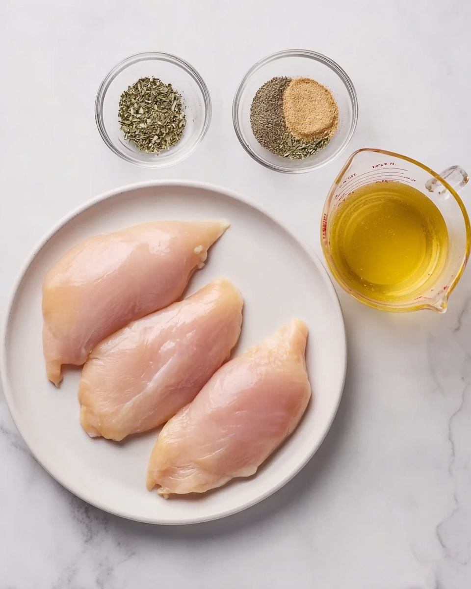 The image shows a white plate with four raw light pink pieces of chicken placed side by side on a white marbled surface. To the left of the plate, three small clear glass bowls hold different powders and herbs: black pepper, green dried herbs, and a light brown spice mix. To the right of the plate, there is a clear measuring cup filled with yellowish liquid, likely broth. The overall scene is bright and clean with a simple arrangement. Photo taken with an iphone --ar 4:5 --v 7