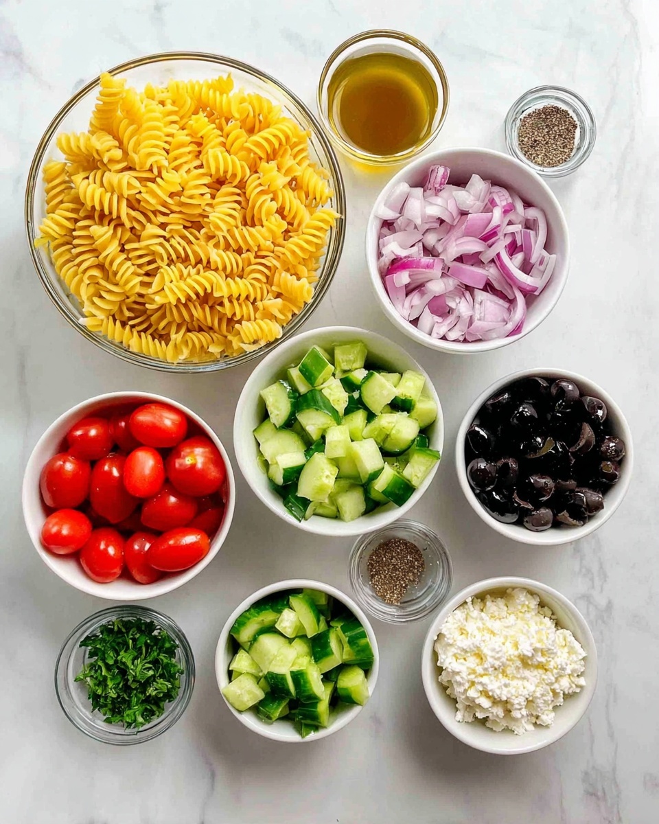 The image shows 10 clear and white bowls arranged on a white marbled surface, each filled with different ingredients for a pasta salad. The largest white bowl on the left has bright yellow dry rotini pasta. Below it, in a white bowl, are halved red cherry tomatoes. To the right of this bowl, there is another white bowl filled with diced cucumbers, showing green skin and pale inside. Above the cucumber bowl, a smaller white bowl contains green bell pepper pieces. Next to it, a white bowl holds sliced black olives. Above the olives, a small white bowl has finely chopped red onions. To the right of the onions is a tiny white bowl with ground black pepper. Below the pepper, a small white bowl contains chopped fresh parsley. Next to the parsley bowl, a small white bowl holds white crumbled cheese. Centered near the top is a medium white bowl with golden brown salad dressing, showing a glossy, smooth texture. photo taken with an iphone --ar 4:5 --v 7