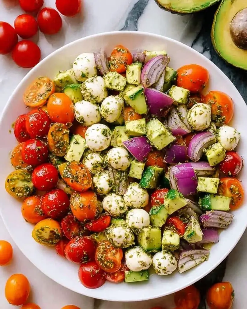 Tomato Cucumber Avocado Salad with Mozzarella and Basil Pesto Recipe