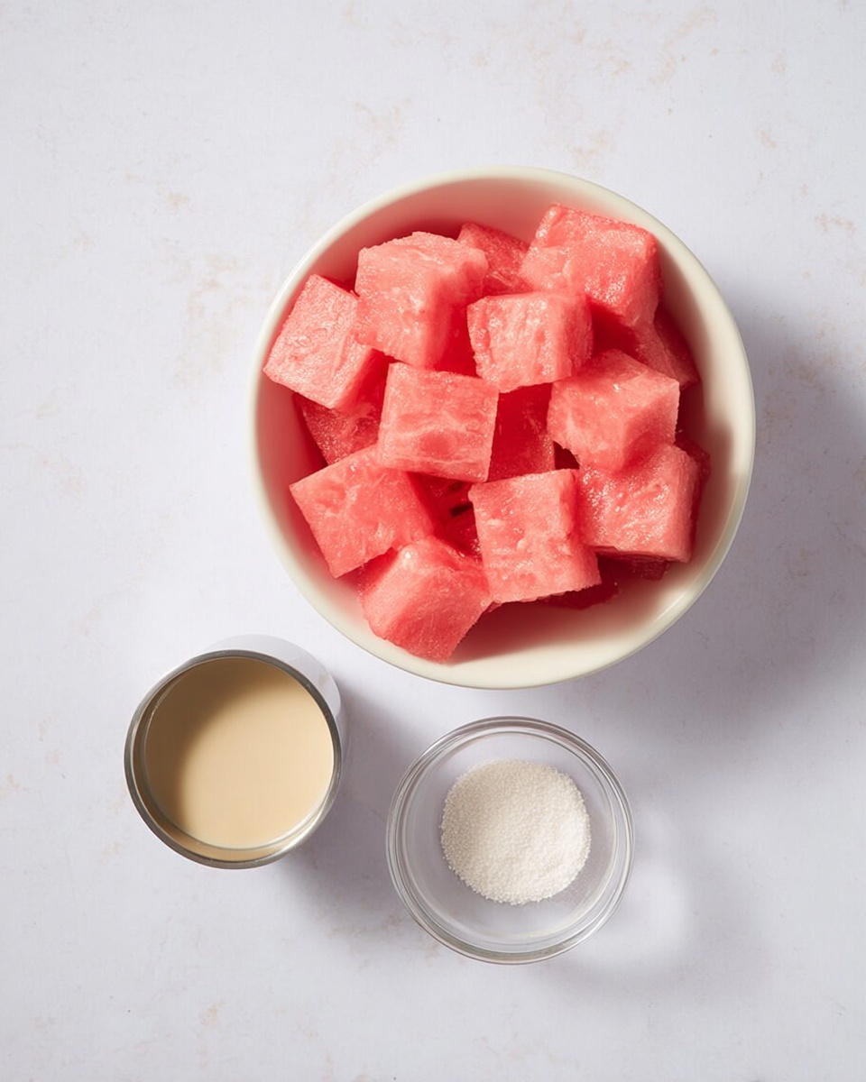 A white bowl filled with bright pink watermelon cubes stacked evenly in layers, next to a small clear glass bowl with white powder and a small metal cup filled with creamy light tan liquid, all set on a white marbled surface photo taken with an iphone --ar 4:5 --v 7