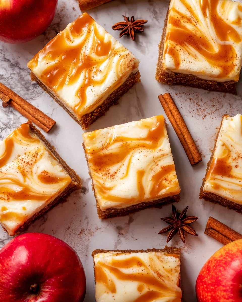 The image shows six square pieces of dessert arranged closely together on a white marbled surface. Each piece has two layers: a bottom brown cake layer with a rough texture, and a thick creamy white frosting layer on top with swirls of caramel-colored sauce creating a marbled effect. The frosting is smooth with tiny specks of spice sprinkled over it. Around the dessert squares are whole cinnamon sticks, star anise, and two red apples, adding a warm and cozy feel to the scene. Photo taken with an iphone --ar 4:5 --v 7