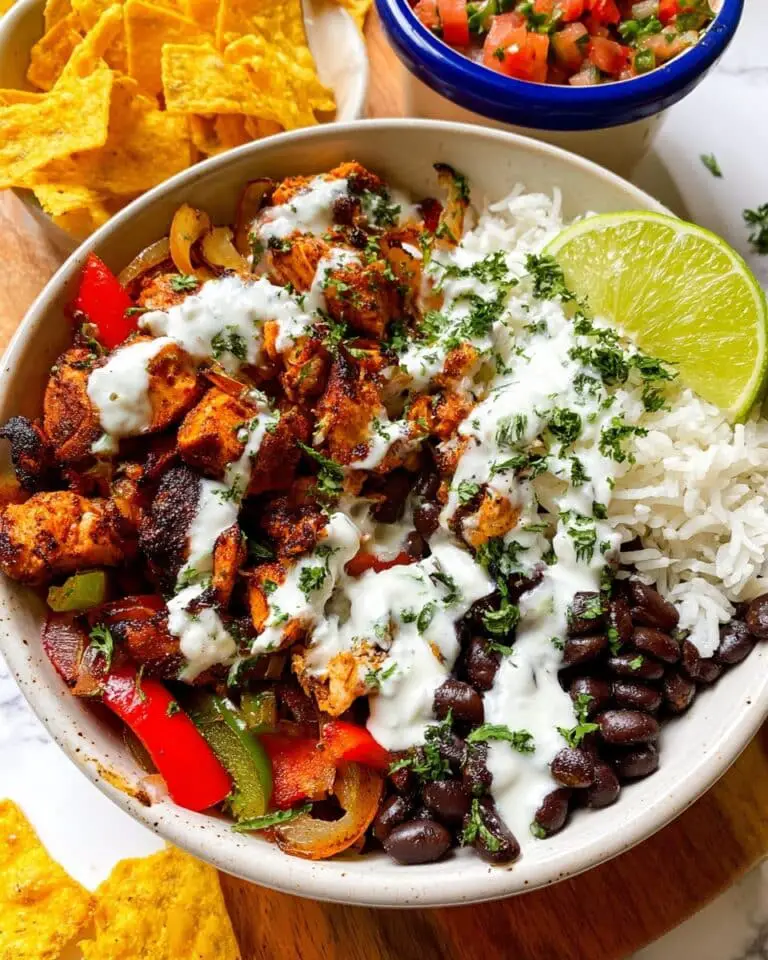Chicken Fajita Bowl with Black Beans, Rice, and Lime Crema Recipe