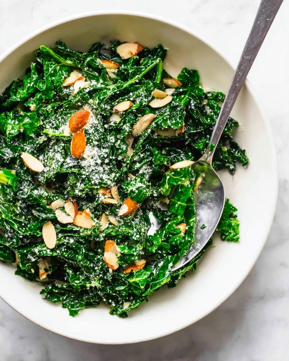 Kale Salad with Lemon-Dijon Dressing, Parmesan, and Toasted Almonds Recipe