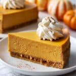 Pumpkin Cheesecake with Gingersnap Crust and Caramel Sauce Recipe