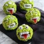 Spooky Monster Popcorn Balls with Vampire Teeth and Candy Eyes Recipe
