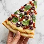 Mediterranean Vegan Flatbread Pizza with Sun-Dried Tomatoes, Olives, and Feta Recipe